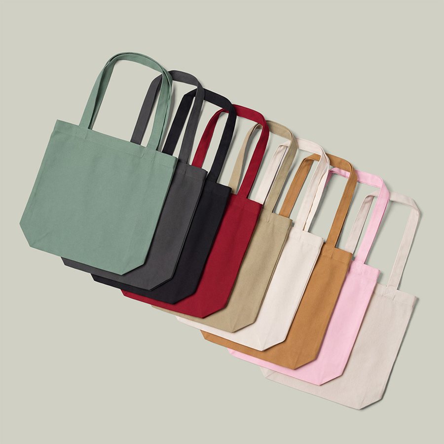 Tote bags in a row of colours